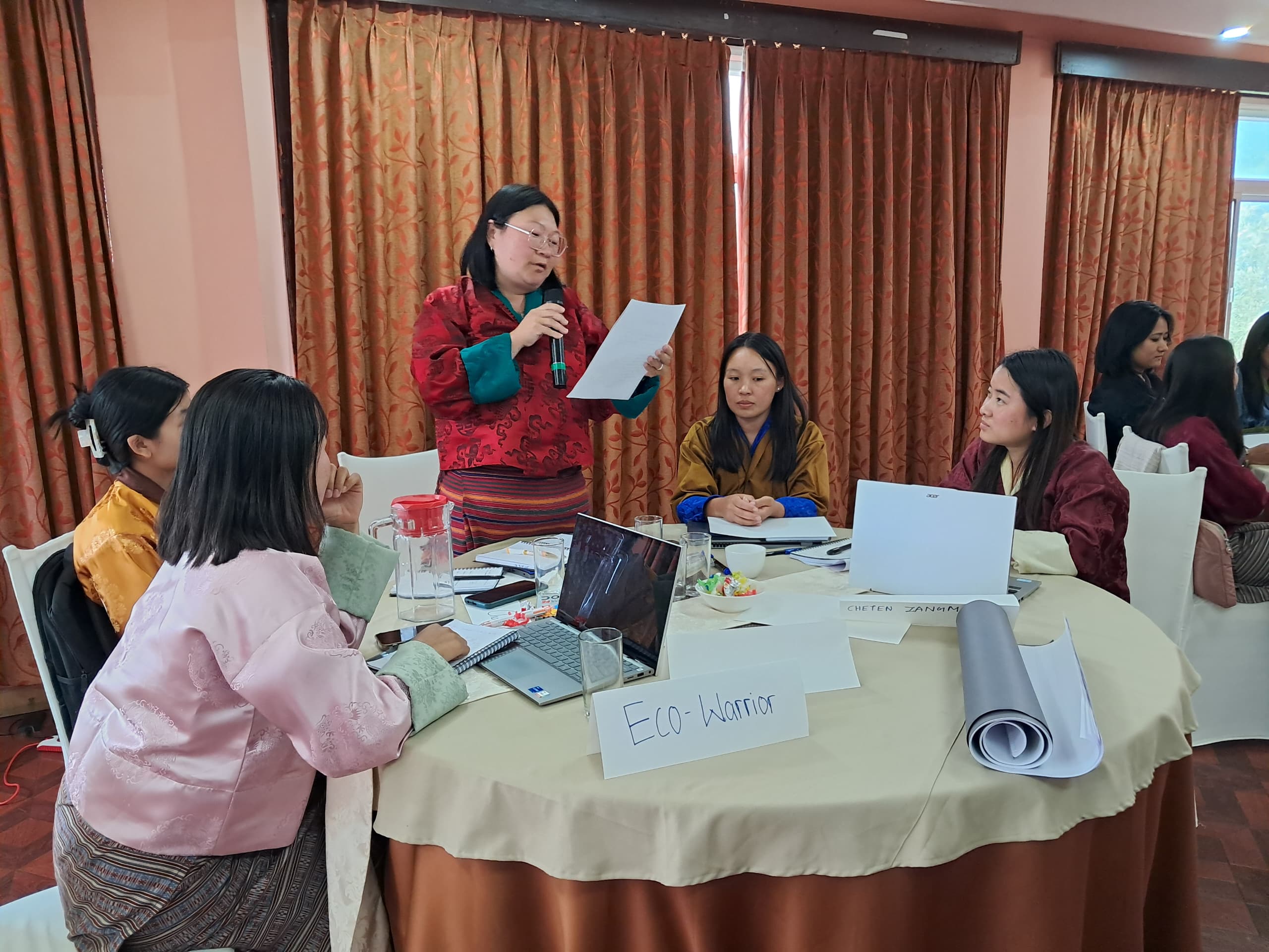 Women cooperators participating in an emotional wellness lecture